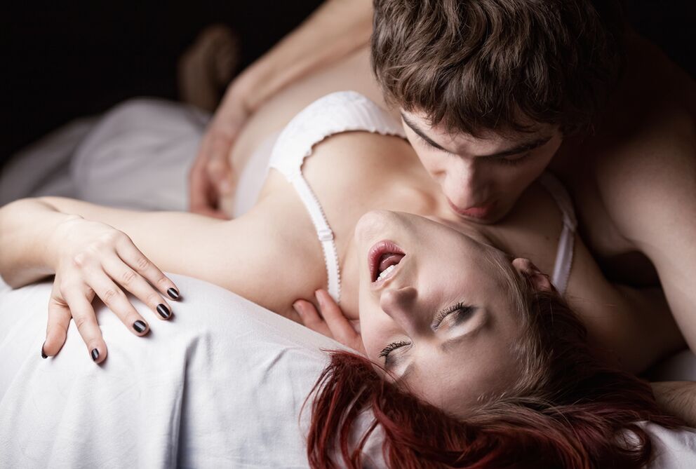 the excited man caresses the woman